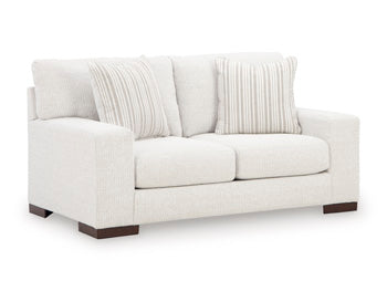 Ashley Furniture Hartside Loveseat with plush fabric and cushioned armrests, shown from an angled view in the image.