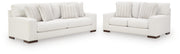 Ashley Furniture Hartside living room set with sofa and armchair in a cozy, modern living room setting.