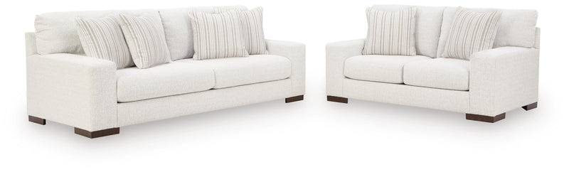 Ashley Furniture Hartside living room set with sofa and armchair in a cozy, modern living room setting.
