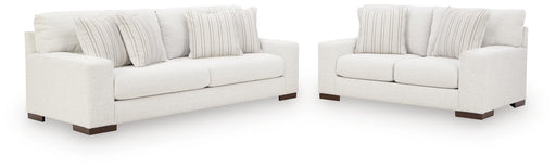 Ashley Furniture Hartside living room set with sofa and armchair in a cozy, modern living room setting.