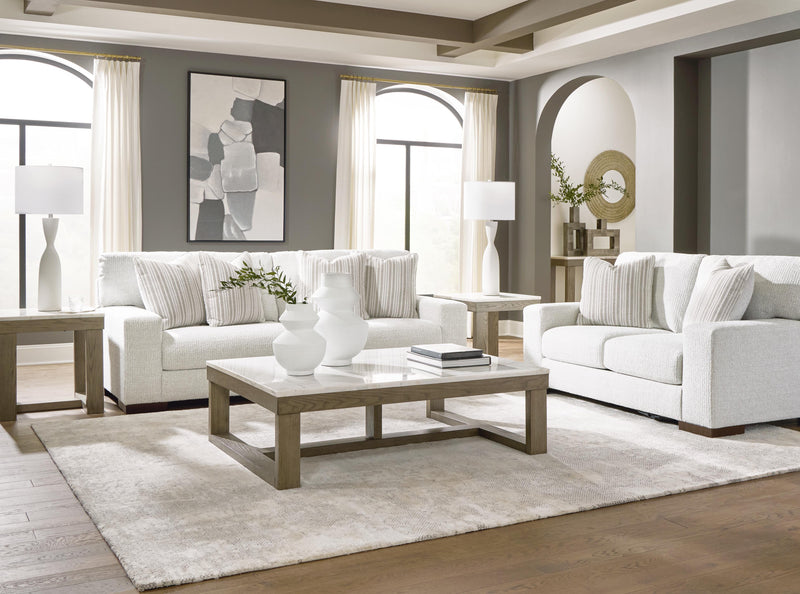 Ashley Furniture Hartside living room set with sofa and loveseat, upholstered in neutral fabric, modern design, and plush cushions.