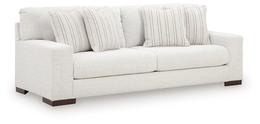 Ashley Furniture Hartside sofa shown from an angled view with plush cushions and modern design in a cozy living room setting.