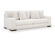 Ashley Furniture Hartside living room set with a sofa and armchair, featuring neutral upholstery and contemporary design.