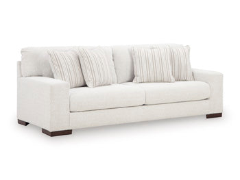 Ashley Furniture Hartside living room set with a sofa and armchair, featuring neutral upholstery and contemporary design.