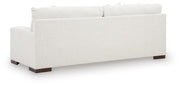 Ashley Furniture Hartside sofa with plush back cushions and neutral fabric, showcasing a stylish and comfortable living room piece.