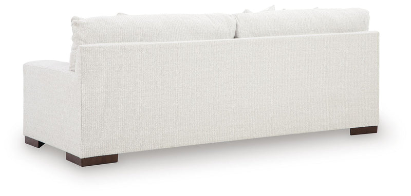Ashley Furniture Hartside sofa with plush back cushions and neutral fabric, showcasing a stylish and comfortable living room piece.