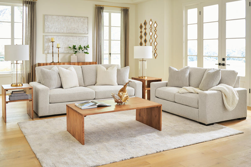 Ashley Furniture Conlee-Pike living room set featuring a sofa and armchair with neutral fabric and modern design.