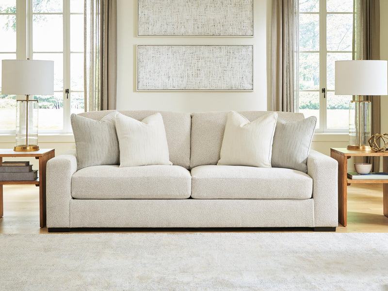 Ashley Furniture Conlee-Pike living room set with sofa and loveseat, upholstered in neutral fabric, in a modern living room setting.