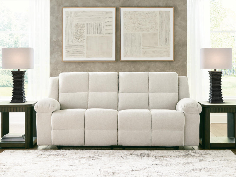 Ashley Furniture Orlen Reclining Sofa in neutral fabric, showing plush cushions and modern design with multiple reclining seats.
