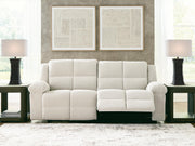 Ashley Furniture Orlen Reclining Sofa in a spacious open view, showcasing plush cushions and reclining features.