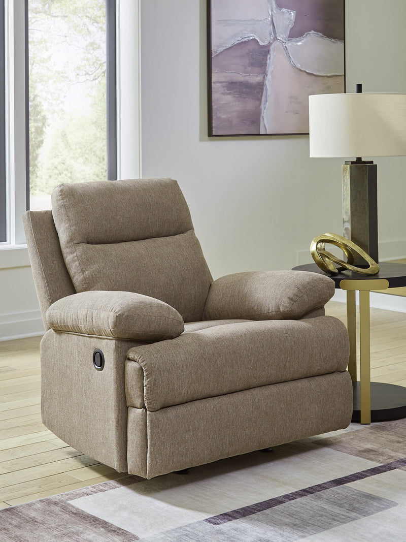 Ashley Furniture Side-Swipe Recliner showing plush fabric upholstery and padded armrests, designed for comfortable seating.