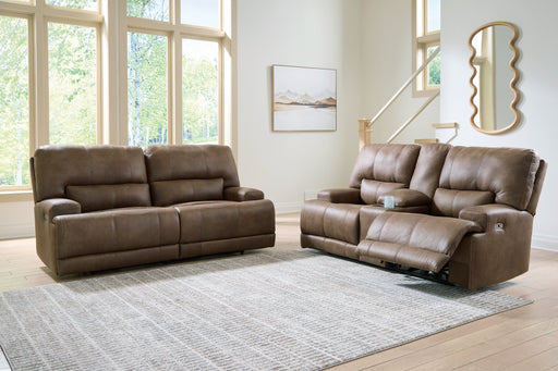 Ashley Furniture Beckley Place reclining living room set with sofa and loveseat, upholstered in neutral fabric.