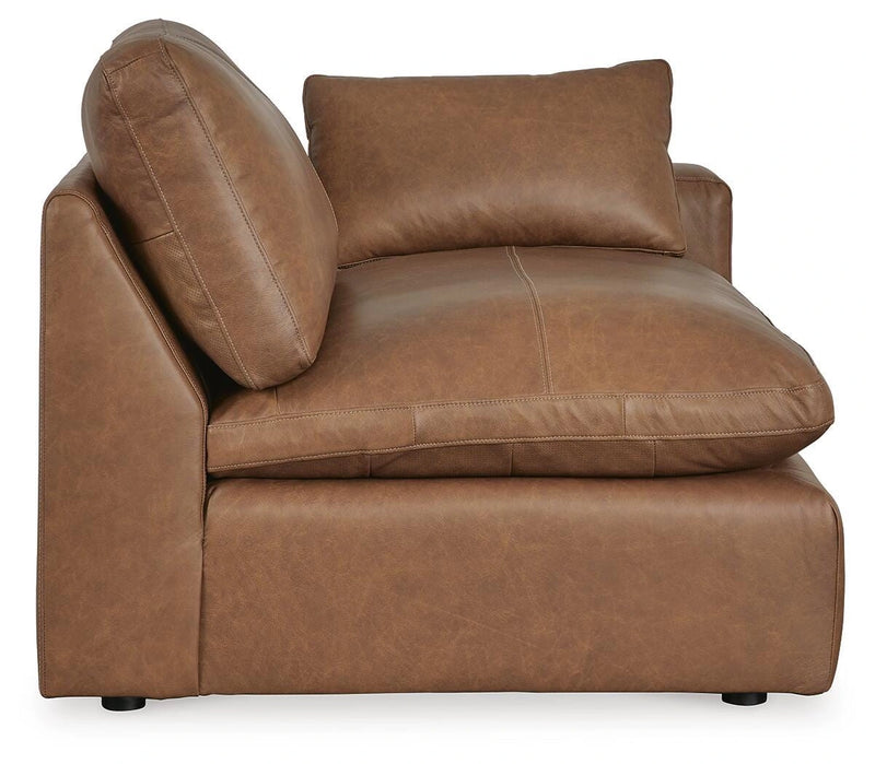 Ashley Furniture Emilia sectional sofa in a neutral fabric with spacious chaise seating