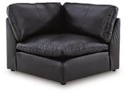 Emilia sectional sofa by Ashley Furniture in a contemporary living room setting