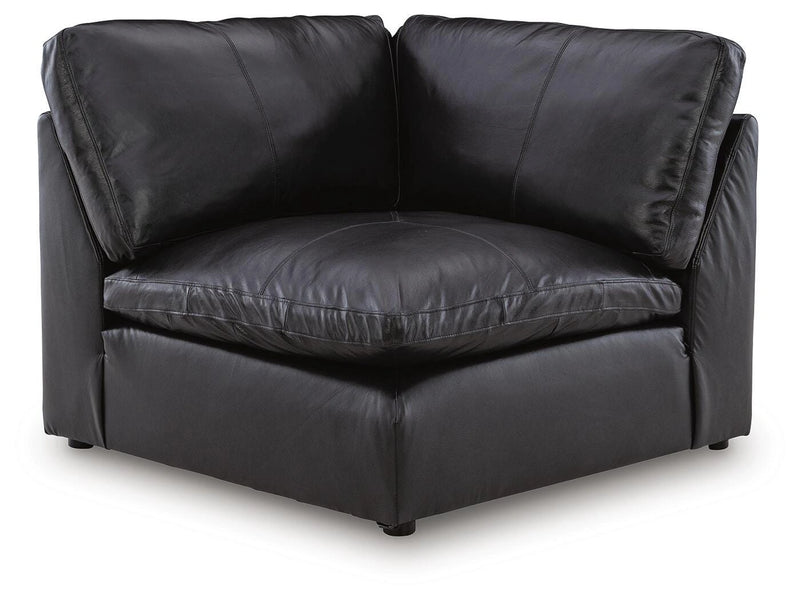 Emilia sectional sofa by Ashley Furniture in a contemporary living room setting