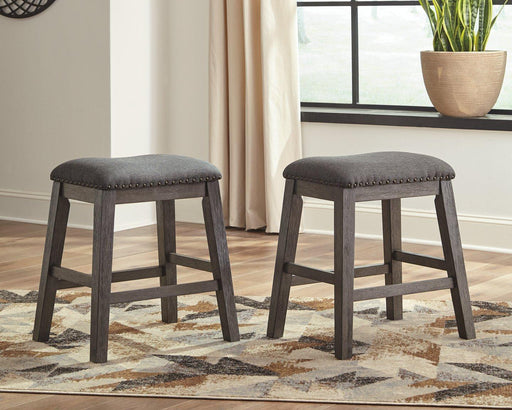 Ashley Caitbrook counter height upholstered bar stool with dark wood finish and padded seat for comfort and style.