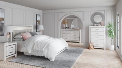 Ashley Furniture Altyra bedroom set featuring a bed, nightstands, and dresser in a modern, coordinated bedroom design.