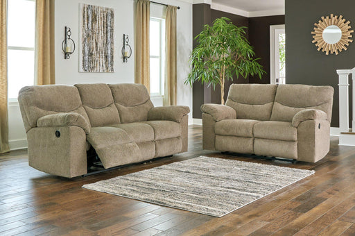 Ashley Furniture Alphons living room set with plush sofas and coordinating coffee table in a modern design.