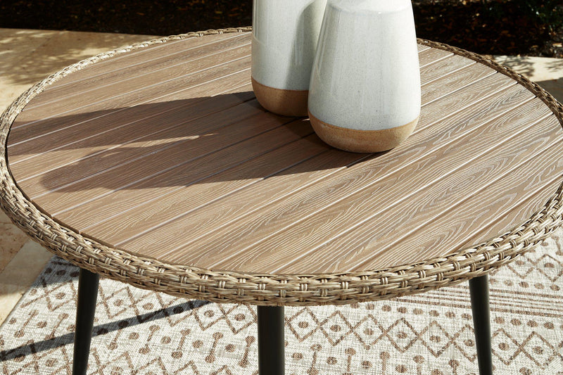 Outdoor dining table from Ashley Furniture with a wooden surface and metal legs, suitable for outdoor patios and gatherings.