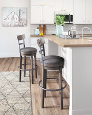 Ashley Furniture Caitbrook bar height bar stool with wooden seat and metal frame, ideal for kitchen or bar area.