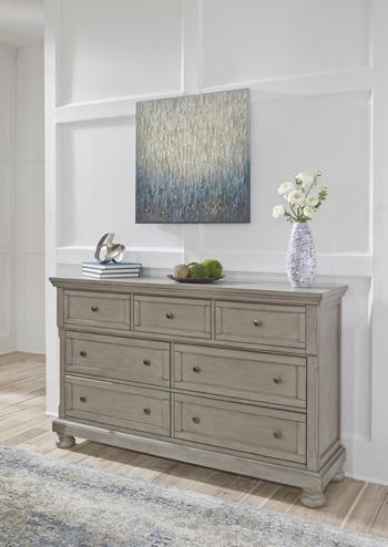 Ashley Furniture Lettner Dresser with multiple drawers and sleek wood finish for stylish bedroom storage.