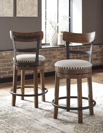 Ashley Furniture Valebeck counter height bar stool with wooden legs and upholstered seat, perfect for kitchen or bar area.