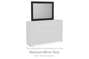 Ashley Furniture Belachime bedroom mirror with a sleek frame, designed for stylish bedroom decor.