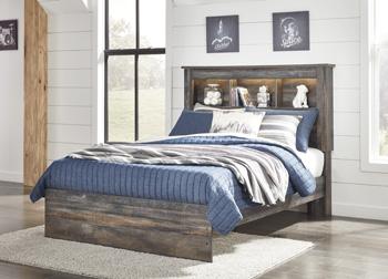 Ashley Furniture Drystan Youth Bed showing a sturdy wooden bed frame with a modern design for kids' bedroom.