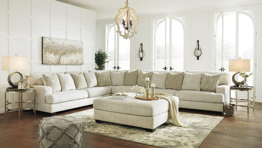 Ashley Furniture Rawcliffe Living Room Set, includes sofa and armchair with neutral fabric and modern design.