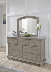 Ashley Furniture Lettner bedroom set with a bed, nightstands, and dresser in a modern bedroom decor.