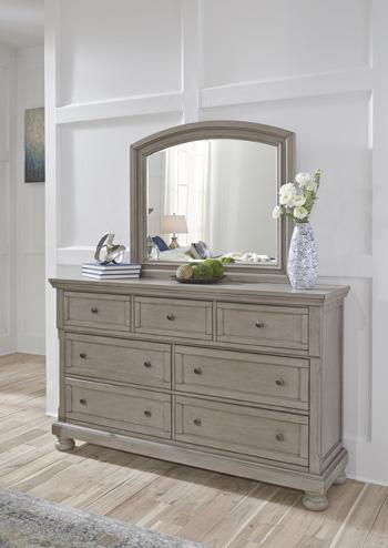 Ashley Furniture Lettner bedroom set with a bed, nightstands, and dresser in a modern bedroom decor.