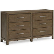 Ashley Furniture Cabalynn dresser and mirror set featuring a sleek wooden dresser with a matching framed mirror.