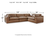 Emilia leather sectional sofa with plush cushions and matching ottoman from Ashley Furniture in a modern living room setting.