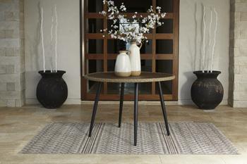 Outdoor dining table by Ashley Furniture, featuring a spacious wooden surface ideal for outdoor meals and gatherings.