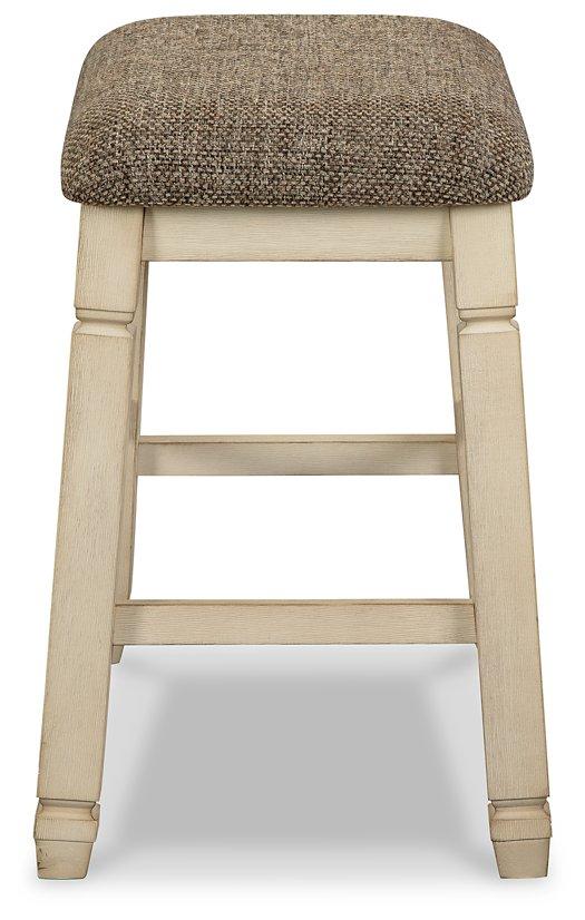 Counter height Ashley Furniture Bolanburg bar stool with wooden legs and upholstered seat for a modern dining or bar area.