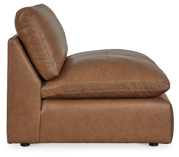 Ashley Furniture Emilia Sectional sofa with plush cushions and modern design, shown in a stylish living room setting.