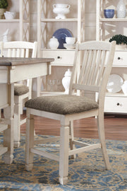 Ashley Furniture Bolanburg counter height bar stool with wooden legs and cushioned seat, ideal for kitchen or bar area.