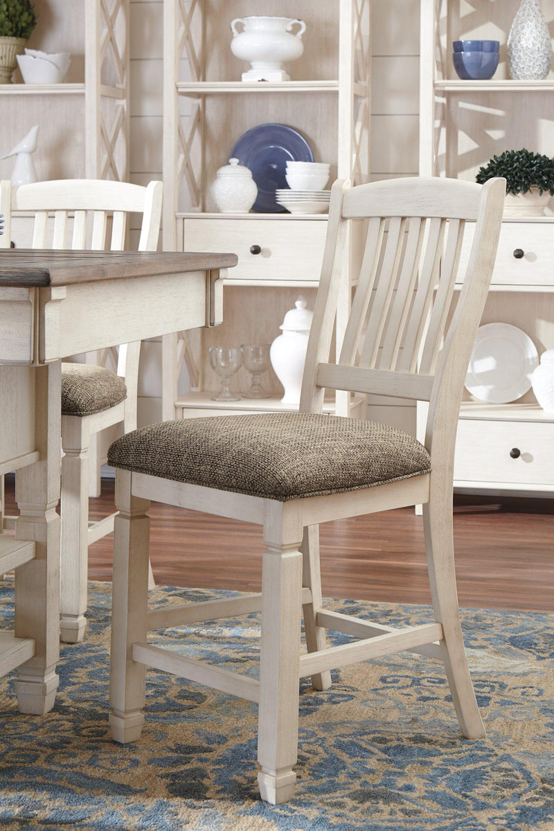 Ashley Furniture Bolanburg counter height bar stool with wooden legs and cushioned seat, ideal for kitchen or bar area.