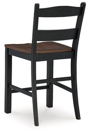 Ashley Furniture Valebeck counter height barstool with wooden legs and upholstered seat, ideal for kitchen or bar area.