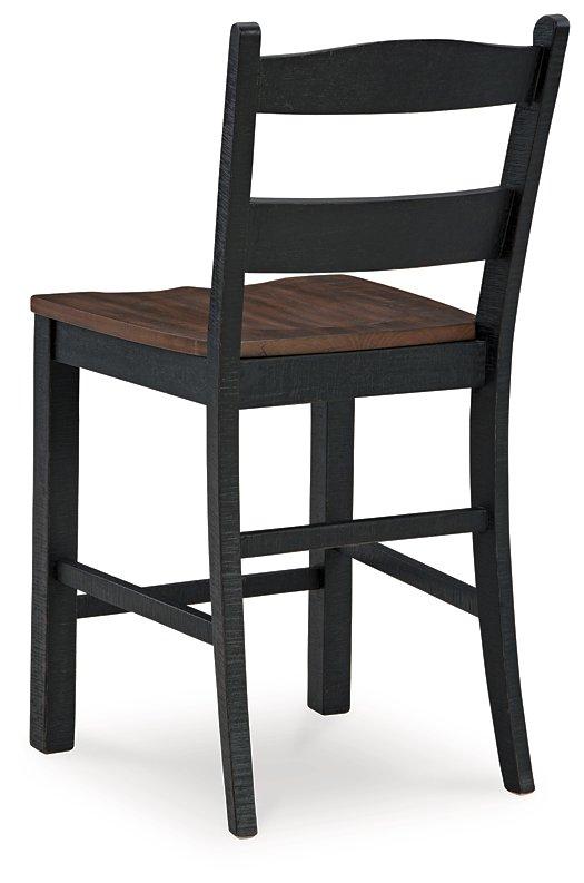 Ashley Furniture Valebeck counter height barstool with wooden legs and upholstered seat, ideal for kitchen or bar area.