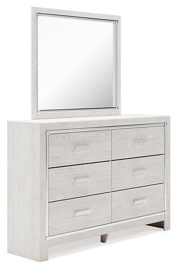 Ashley Furniture Altyra dresser with matching mirror, featuring a modern wooden design and sleek storage drawers.