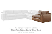 Comfortable Ashley Furniture Emilia Sectional with plush cushions and modern design, shown in a spacious living room setting.