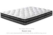 10 inch Ashley Furniture hybrid mattress with pocketed coils and foam layers, showcasing the plush fabric cover and supportive structure.