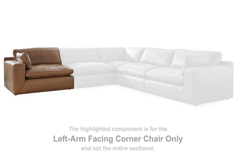 Ashley Furniture Emilia Sectional sofa with plush cushions and modern design, shown in a cozy living room setting.