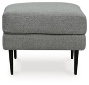 Ashley Hazela Living Room Set with sofa and armchair featuring neutral upholstery and modern design.