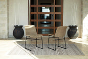 Set of two Ashley Furniture Amaris outdoor dining chairs with metal frames and cushioned seats for patio dining.