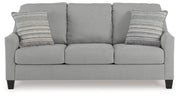 Adlai Sofa Sleeper by Ashley Furniture showing a modern gray sleeper sofa with plush cushions and a convertible design.