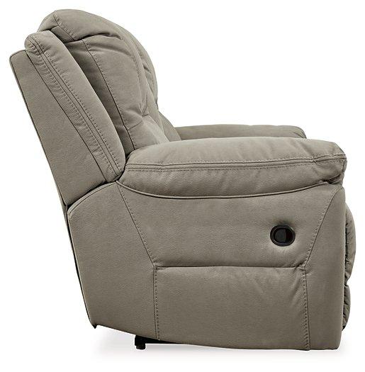 Next-Gen Gaucho Reclining Loveseat with Console by Ashley Furniture, showing plush gray fabric, built-in armrest console, and reclining features.