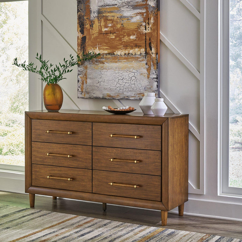Ashley Furniture Lyncott dresser and mirror set featuring a wooden dresser with a matching mirror and modern design.