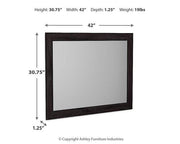 Ashley Furniture Belachime bedroom mirror with a sleek frame, ideal for adding style and functionality to your bedroom decor.